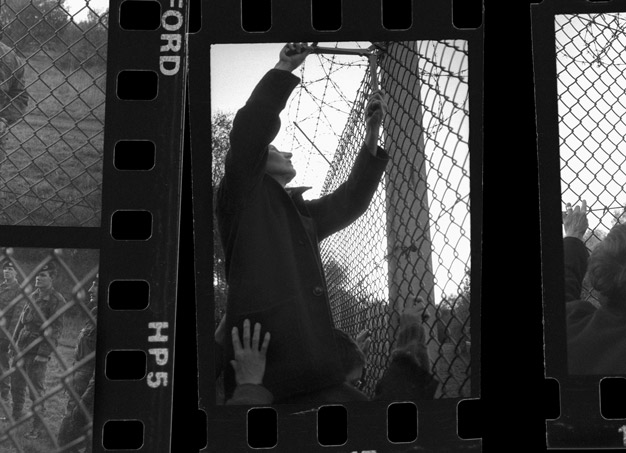 Leah cutting the fence Greenham Common