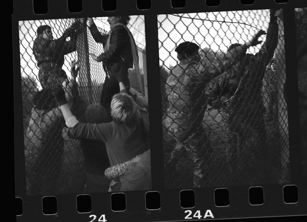 grabbing the bolt cutters Greenham Common